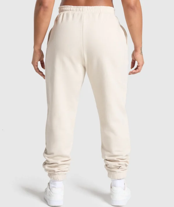 Gymshark Joggers & Sweatpants*Lifting Essentials Graphic Brushed Oversized Joggers OatWhite