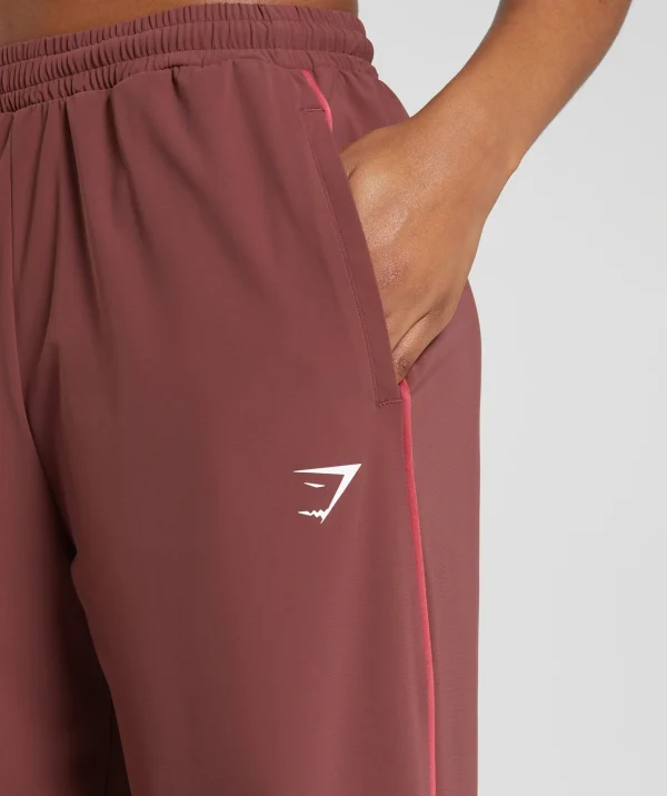 Gymshark Joggers & Sweatpants*Stitch Feature Woven Pants BurgundyBrown